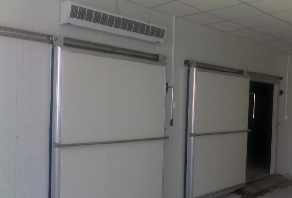西宁制冷-冷库门普通配合风幕机减少冷库冷量的损失及冷库设计装置验收规范